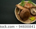 Shiitake mushrooms in a colander Copy space 94600841