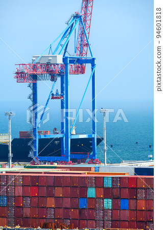 industrial seaport infrastructure, commercial dock and container warehouse, sea, cranes and cargo ship, concept of sea cargo transportation 94601818