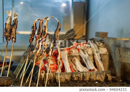 Charcoal grilling of Iwana Charcoal grilling of Iwana 94604231