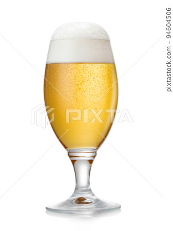 Glass of lager draught craft ipa premium beer with foam on white. 94604506