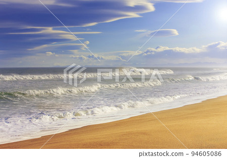 Beautiful yellow sand beach. Blue ocean and yellow sand 94605086