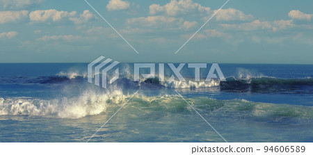 Big beautiful waves in the Pacific ocean on Kamchatka 94606589
