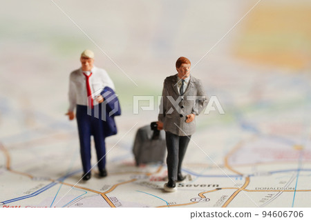 Business people rushing and going on a long trip for a work meeting at office. Business people rushing and going on a long trip for a work meeting at office. 94606706