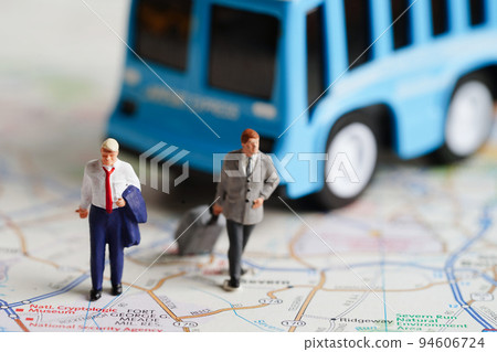 Business people rushing and going on a long trip for a work meeting at office. Business people rushing and going on a long trip for a work meeting at office. 94606724