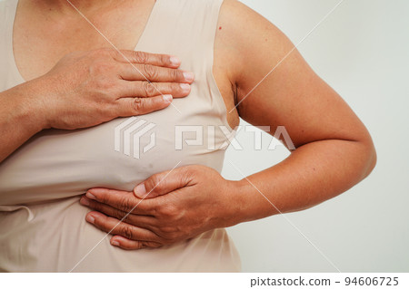 Asian woman self touching check lump or Breast cancer, Breast Self Exam. Asian woman self touching check lump or Breast cancer, Breast Self Exam. 94606725