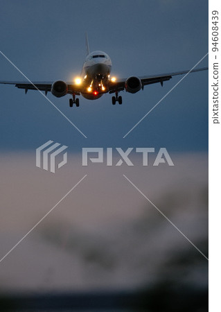 Airplane and beautiful scenery at Itami Airport Airplane and beautiful scenery at Itami Airport 94608439