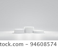 Three white circular podium arranged next to each other on white background. for product advertisement or product presentation. display stand.Ranking competition. 3D rendering 94608574