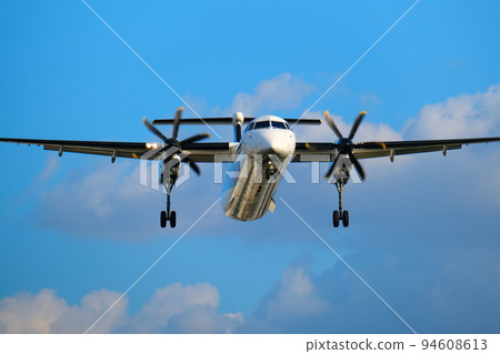 Airplane and beautiful scenery at Itami Airport Airplane and beautiful scenery at Itami Airport 94608613