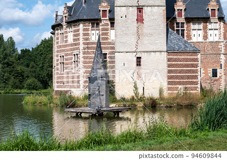 Holsbeek, Flemish Brabant Region, Belgium, Landscape view over the pond and medieval castle Holsbeek, Flemish Brabant Region, Belgium, Landscape view over the pond and medieval castle 94609844