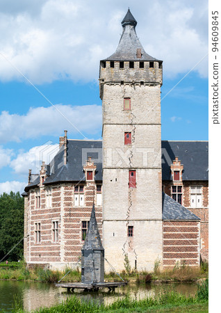 Holsbeek, Flemish Brabant Region, Belgium,  Landscape view over the pond and medieval castle 94609845
