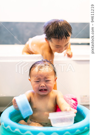 Brothers taking a bath Infant Toddler Brothers taking a bath Infant Toddler 94611219