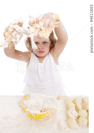 cooking and people concept - girl smiling chef with kitchen utensils, isolated on a white background. 94611605