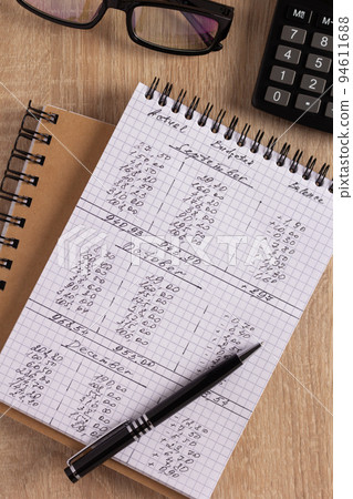 Business accounting workplace and stationary supplies on desk table background Business accounting workplace and stationary supplies on desk table background 94611688
