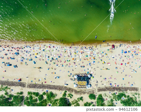 Aerial view of the beach and sea shore in Palanga, Lithuania. Beach town in Palanga. Aerial view of the beach and sea shore in Palanga, Lithuania. Beach town in Palanga. 94612106