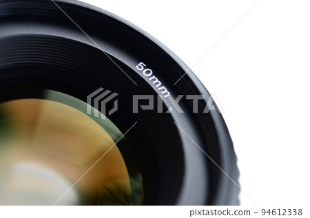 Fragment of a portrait lens for a modern SLR camera. A photograph of a wide-aperture lens with a focal length of 50mm isolated on white Fragment of a portrait lens for a modern SLR camera. A photograph of a wide-aperture lens with a focal length of 50mm isolated on white 94612338