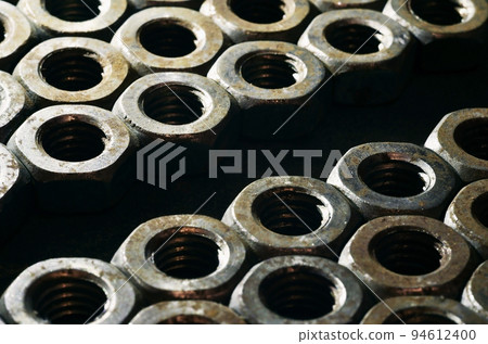 Close-up of rusty nuts 94612400