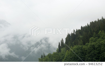 Mountain lake in the fog 94613252