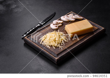 Raw pasta, mushrooms, onions, mince, spices and herbs to make a delicious paste 94614351