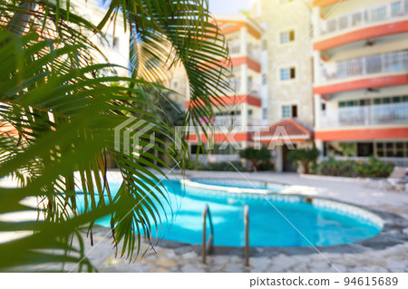 Backyard swim pool side 94615689