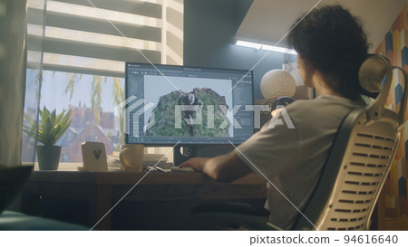 Guy making 3D animation for video game Guy making 3D animation for video game 94616640