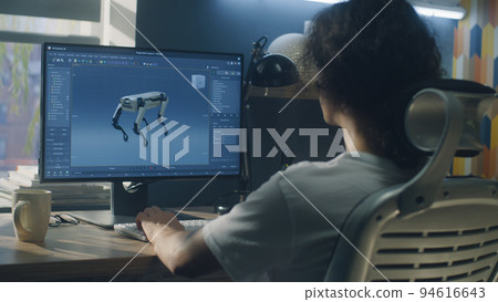 Man creating 3D prototype of robot on pc 94616643