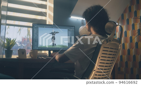 Guy making 3D animation for video game Guy making 3D animation for video game 94616692