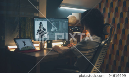 Guy making 3D animation for video game 94616699