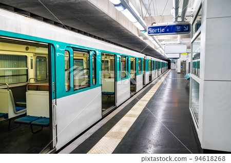 Train at Mairie d'Aubervilliers metro station in Paris, France Train at Mairie d'Aubervilliers metro station in Paris, France 94618268