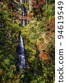 Goho Falls surrounded by autumn leaves 94619549