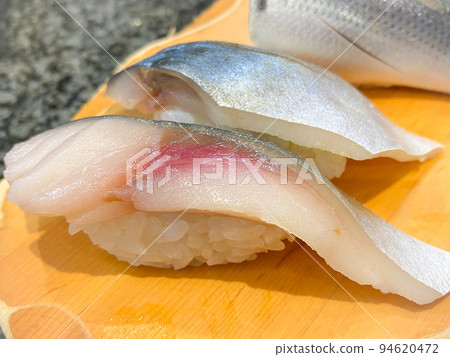 A handful of fresh raw mackerel 94620472