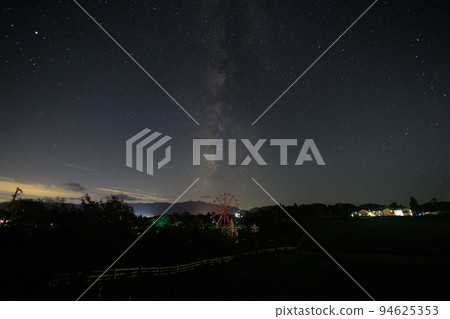 The Milky Way floating in the sky of an amusement park in Hiruzen Kogen in Maniwa, Okayama Prefecture, Japan 94625353