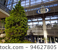 Planting trees and a clock inside the building 94627805