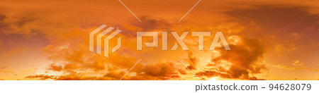 Golden glowing red orange overcast sunset sky panorama. Hdr seamless spherical equirectangular 360 panorama. Sky dome or zenith for 3D visualization and sky replacement for aerial drone 360 panoramas. Golden glowing red orange overcast sunset sky panorama. Hdr seamless spherical equirectangular 360 panorama. Sky dome or zenith for 3D visualization and sky replacement for aerial drone 360 panoramas. 94628079