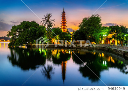 Tran Quoc Pagoda at twilight in Hanoi, Vietnam. Tran Quoc Pagoda at twilight in Hanoi, Vietnam. 94630949