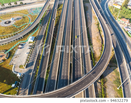 Aerial view of morning junction road from above automobile traffic 94632279