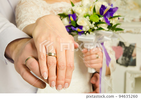 wedding hands 94635260