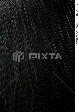 rain on a black background 94635357