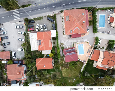 aerial drone view village at seaside with red roofs aerial drone view village at seaside with red roofs 94636562