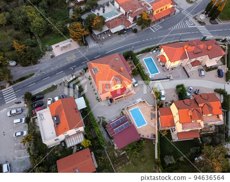 aerial drone view village at seaside with red roofs aerial drone view village at seaside with red roofs 94636564