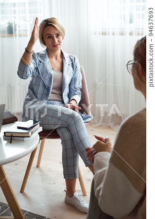 Young woman at a consultation with a psychologist, mental health care 94637693