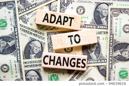 Adapt to changes symbol. Concept words Adapt to changes on wooden blocks on dollar bills. Beautiful background from dollar bills. Business and Adapt to changes quote concept. Copy space. Adapt to changes symbol. Concept words Adapt to changes on wooden blocks on dollar bills. Beautiful background from dollar bills. Business and Adapt to changes quote concept. Copy space. 94639628