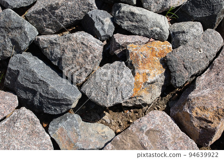 A bunch of different stones, background or texture A bunch of different stones, background or texture 94639922
