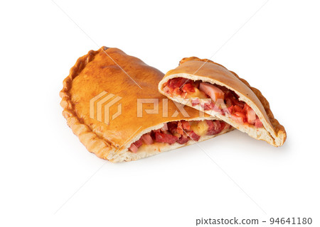 Pepperoni and cheese filled calzone pizza isolated on a white background 94641180