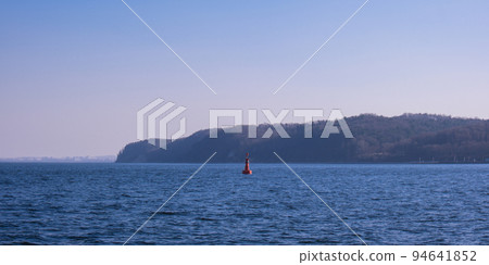 Lighthouse on blue sea line. Waves on sunny day on Baltic sea. Gdansk Poland Lighthouse on blue sea line. Waves on sunny day on Baltic sea. Gdansk Poland 94641852