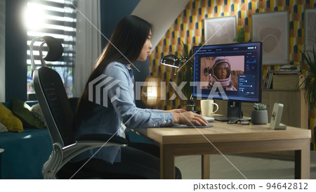 Asian woman editing photo 94642812