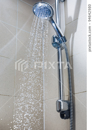 shower with water stream, close-up view 94642980