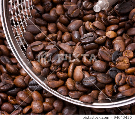 fried coffee beans background fried coffee beans background 94643430