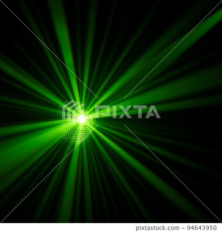 Disco ball with rays in haze 94643950