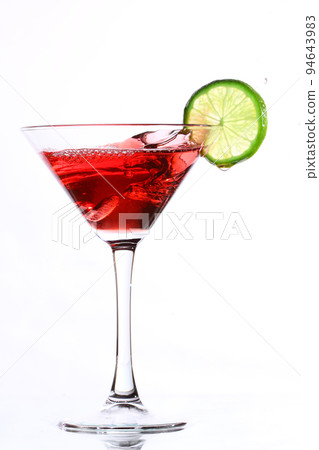 red cocktail with lime on white red cocktail with lime on white 94643983