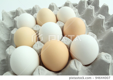 chicken eggs in the container 94644007